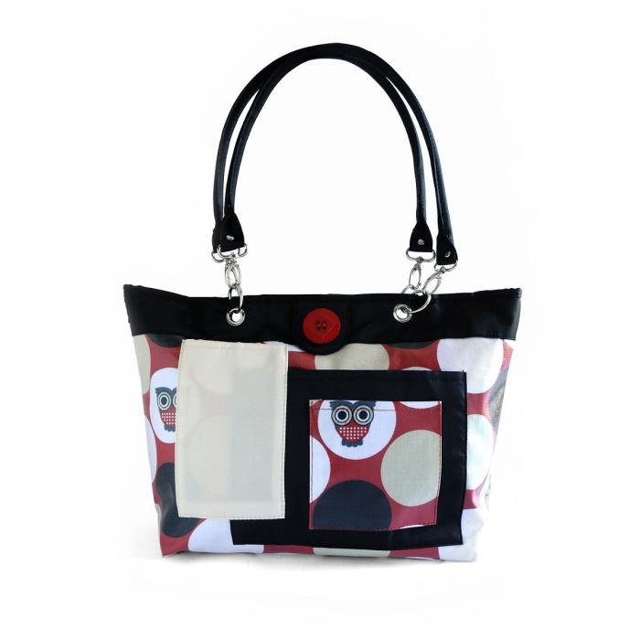Tote bag with owl-themed polka dot pattern and black handles.